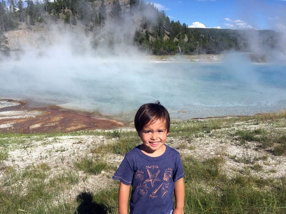 Little boy at Grand Tetons National Park, one of the best national parks for families.
