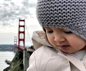 San Francisco Vacation Kids, Little girl in front of Golden Gate Bridge in San Francisco