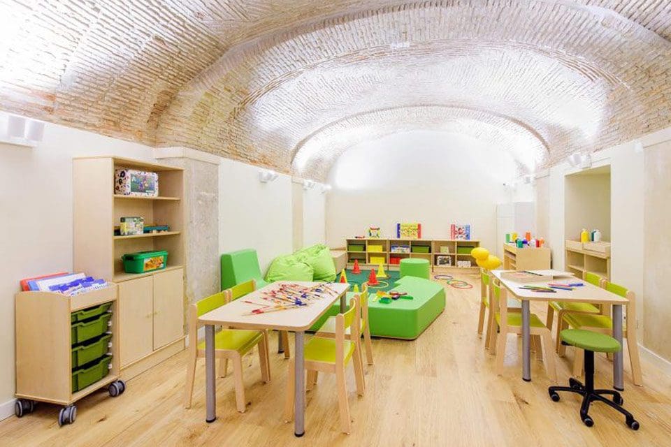 Inside the brightly colored kids club at Martinhal Lisbon Chiado Family Suites.