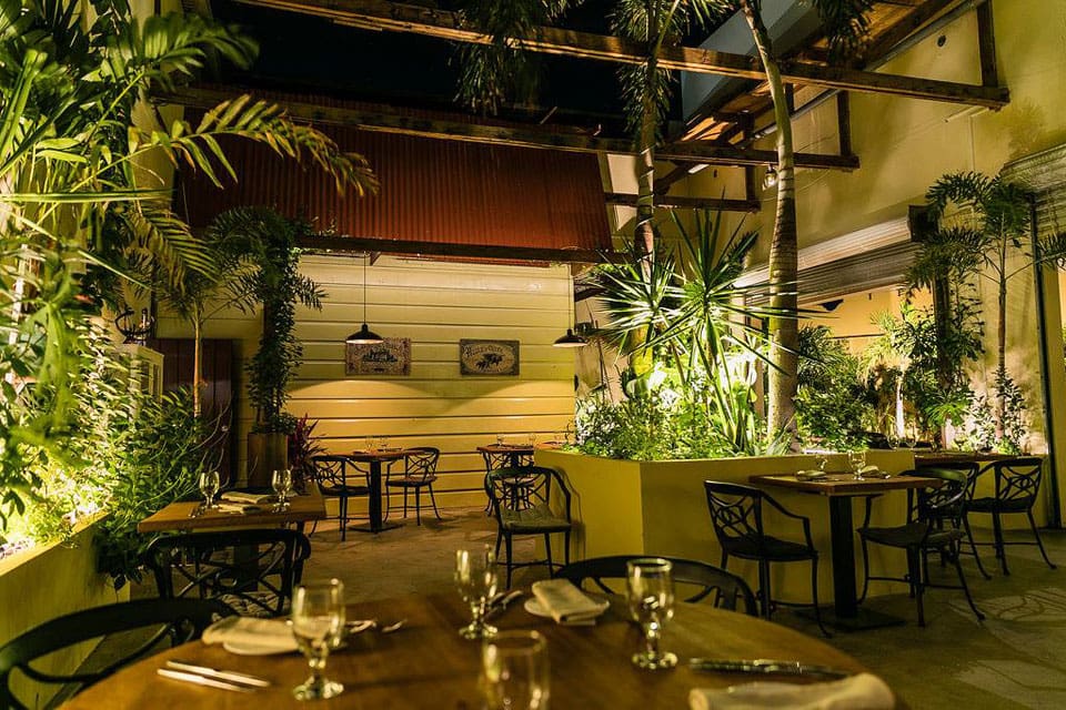 Outdoor seating, with charming mood lighting, at Wilhelmina Restaurant.