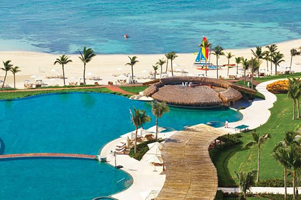 An aerial view of the pool and beach at Grand Velas Riviera Maya.