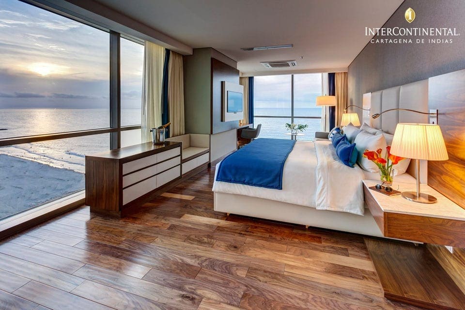 Inside one of the rooms at the InterContinental Cartagena de Indias, an IHG Hotel, featuring a king bed and an ocean view.