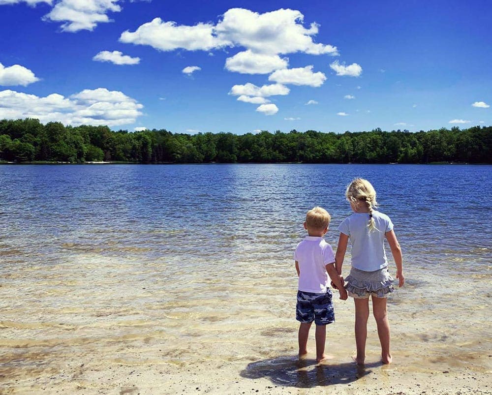 Boy and a girl in Lake Naomi, PA, best lakes to visit from NYC with kids!