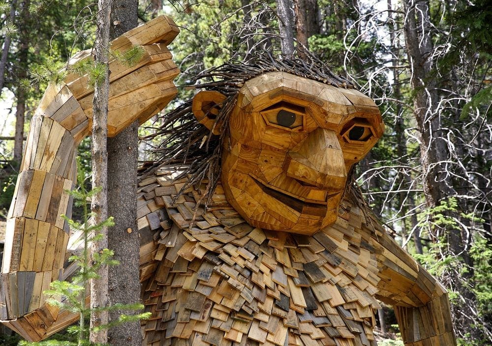 A close up of Isak Hearstone's wooden face. This iconic Breckenridge troll is made of sticks and wooden shingles.