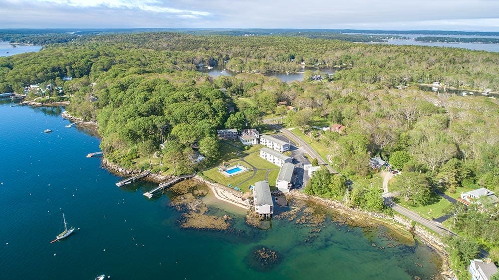 An aerial view of Smuggeler's Cove Inn on a sunny, summer day.