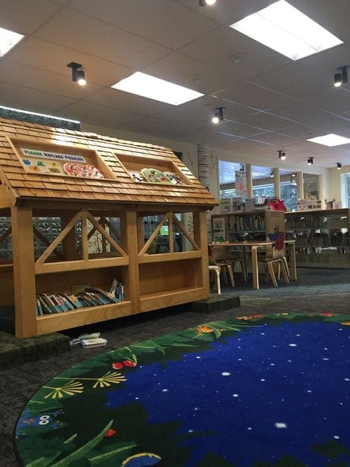 A view of a large book shelf at the Vail Library, one of the best kid-friendly activities in Vail.