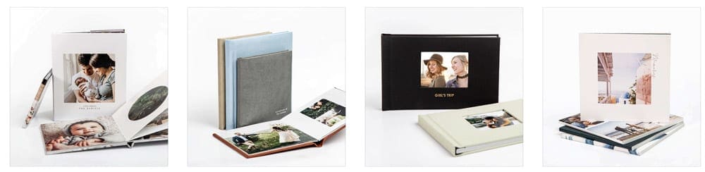Four family photo books featuring styles by Printique.