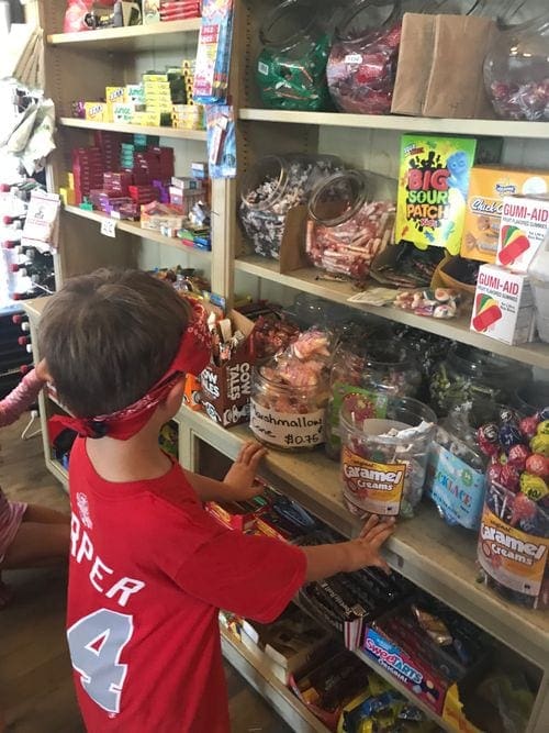 A young boy surveys treat options while shopping in Alley General Store on Martha's Vinyard.