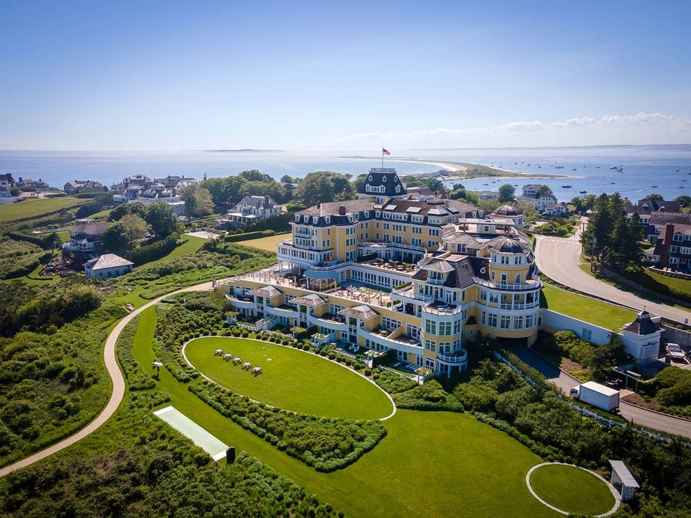 An aerial view of the grounds at Ocean House with the ocean in the background.