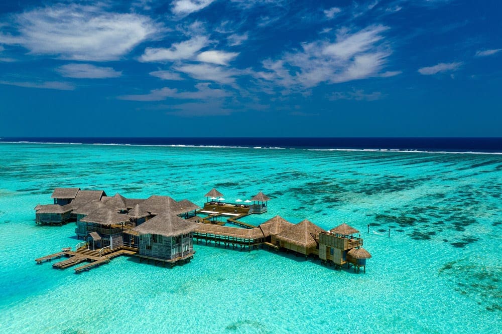 A view of the overwater bungalows at Gili Lankanfushi Maldives, one of the best family hotels in the Maldives.