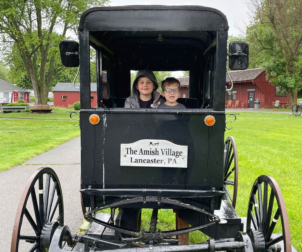 Kids kids in Amish carriage in Amish Village