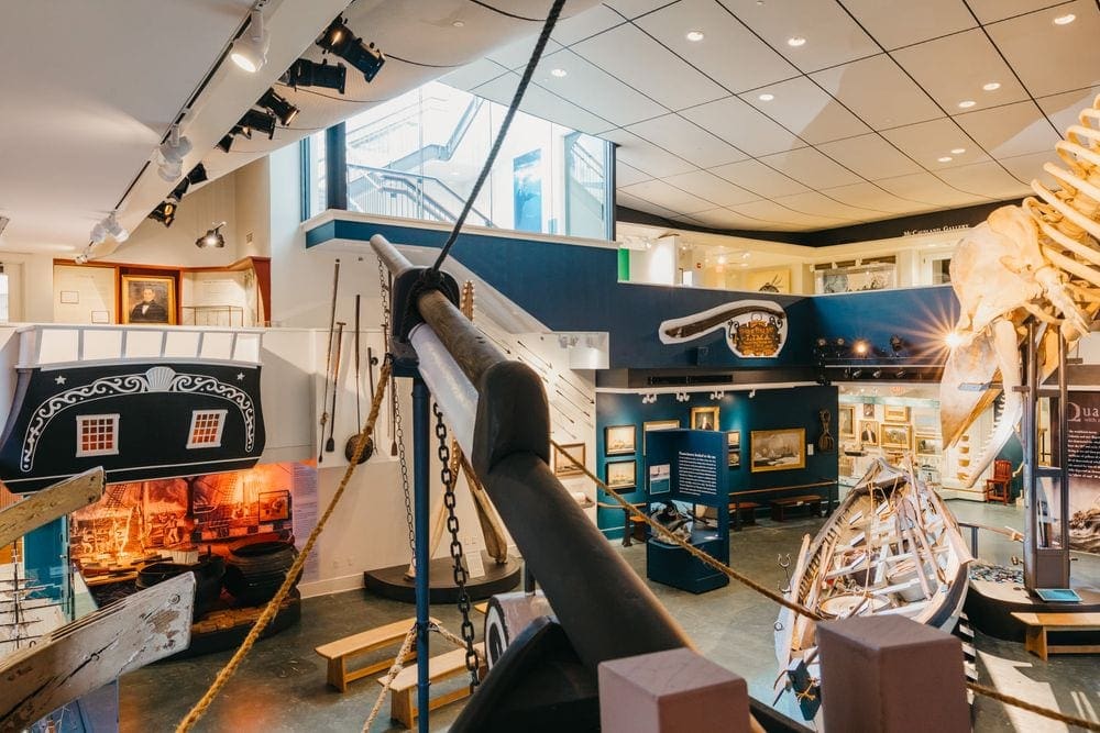 Inside the Whaling Museum, featuring nautical-themed exhibit stations, a great place to check out while on a on at family vacation to Nantucket.