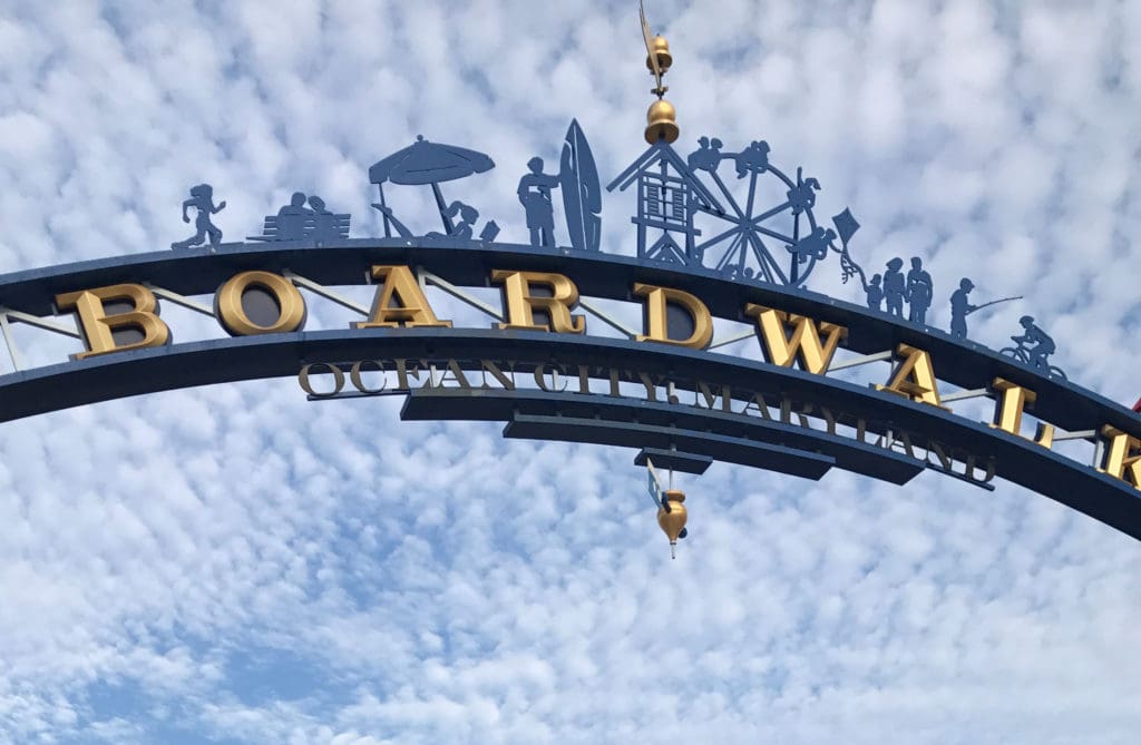 A view of the boardwalk arch for Ocean City on a bright, sunny day.