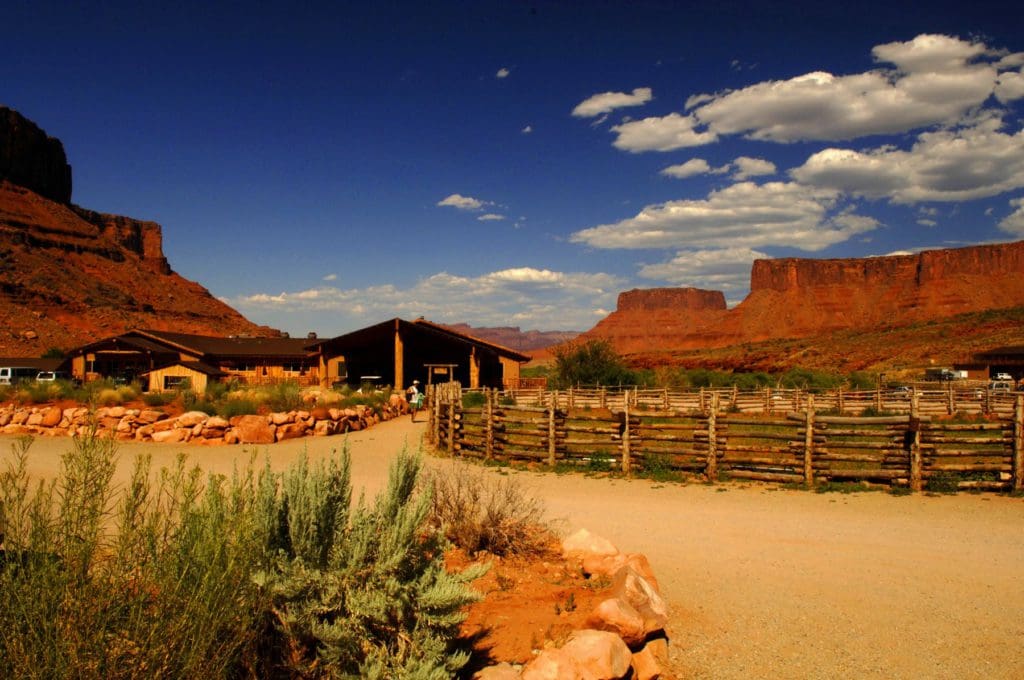 The entrance to Red Cliffs Lodge, with Utah's iconic red rock formations in the distance.