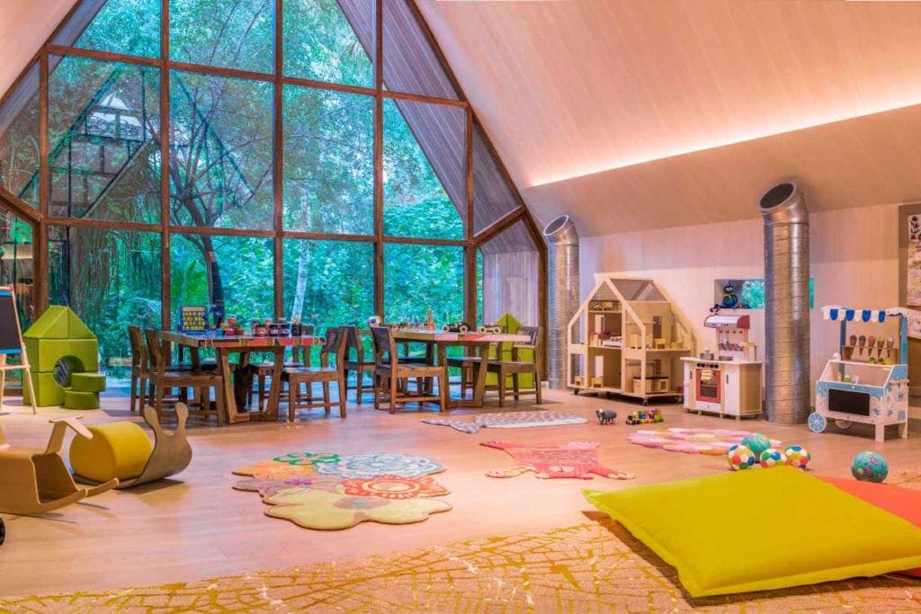 Inside the kids club, featuring colorful furniture and toys at St. Regis Maldives Vommuli Resort, one of the best family hotels in the Maldives.