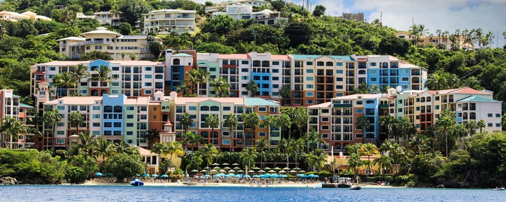 A view of the colorful exterior of the accommodations at the Marriott’s Frenchman’s Cove, one of the best US Virgin Islands resorts for families.