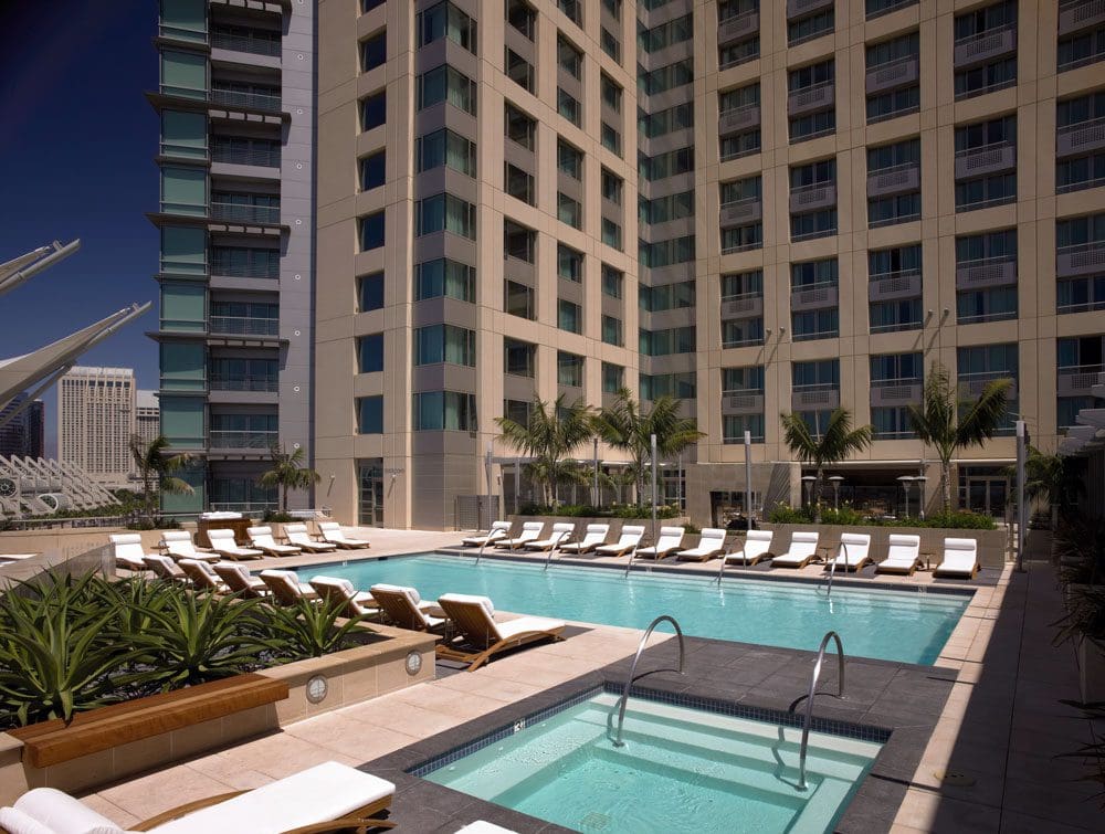 The pool and surrounding pool deck at the Omni San Diego Hotel.
