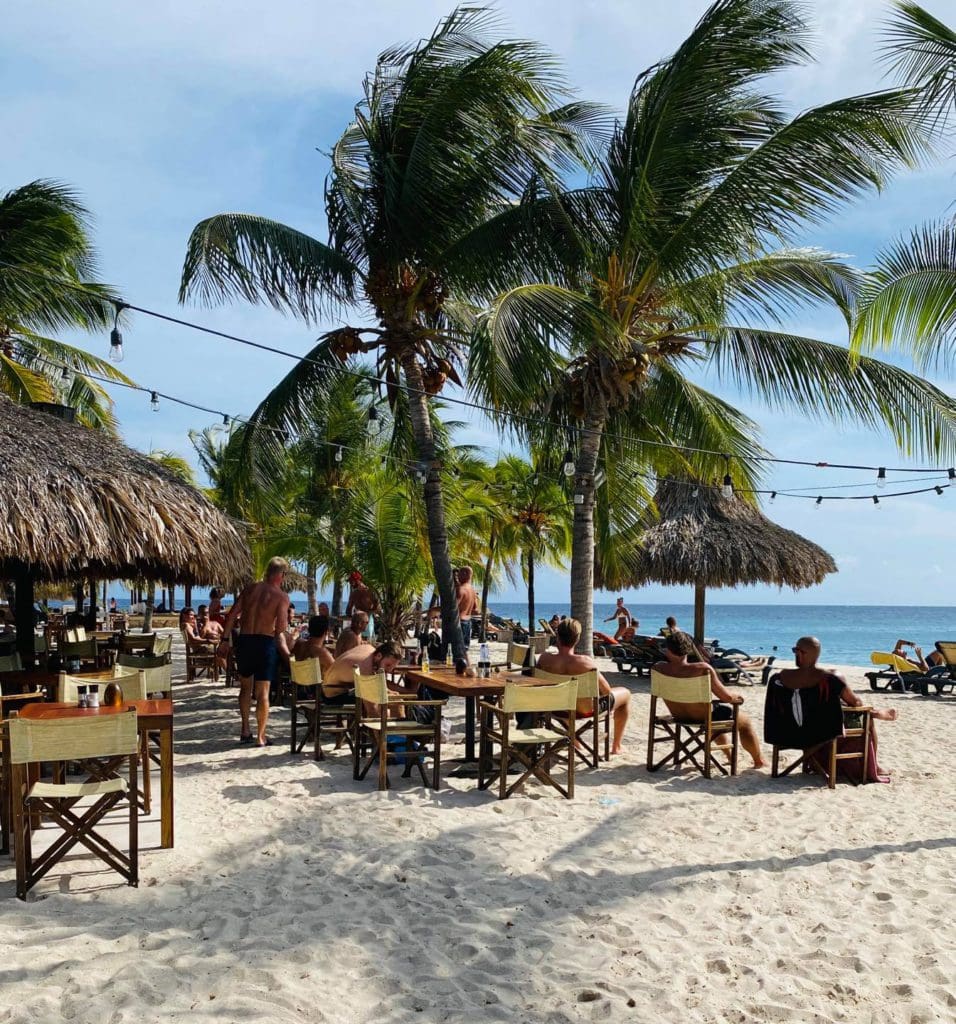 The outdoor beach seating at Zanzibar Restaurant & Bar on a sunny day.