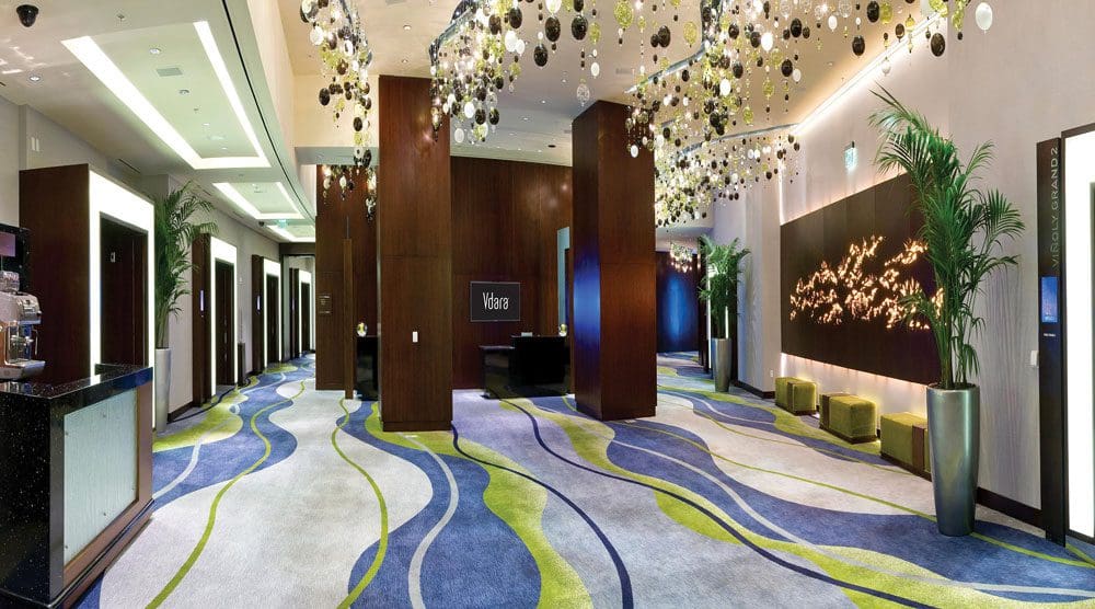 The entrance lobby to to Vdara Hotel and Spa, featuring stylish furnishings.