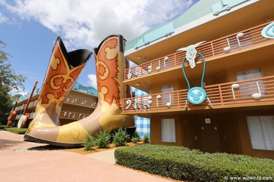 Two cowboy boots adorn the corner of a resort building at Disney's All-Star Movies Resort.