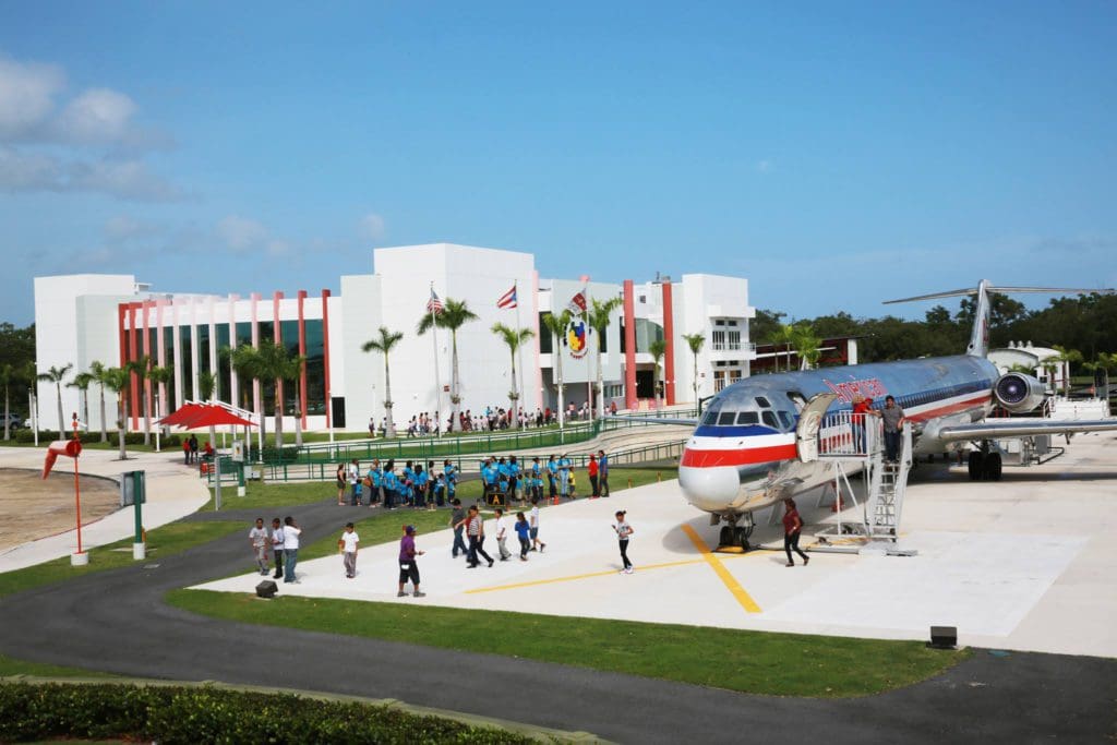 The outside exhibits at the Museo del Niño de Carolina, featuring a large plane, one of the best things to do in Puerto Rico with kids.