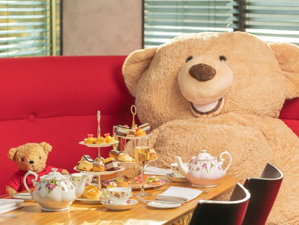 Two teddy bears enjoy afternoon tea at the The Watergate Hotel.