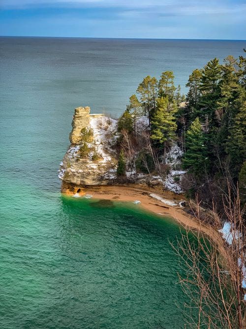 A view of the iconic Miners Castle rock formation in Michigan on the shores of Lake Superior, one of the best Upper Peninsula Michigan hikes for families.