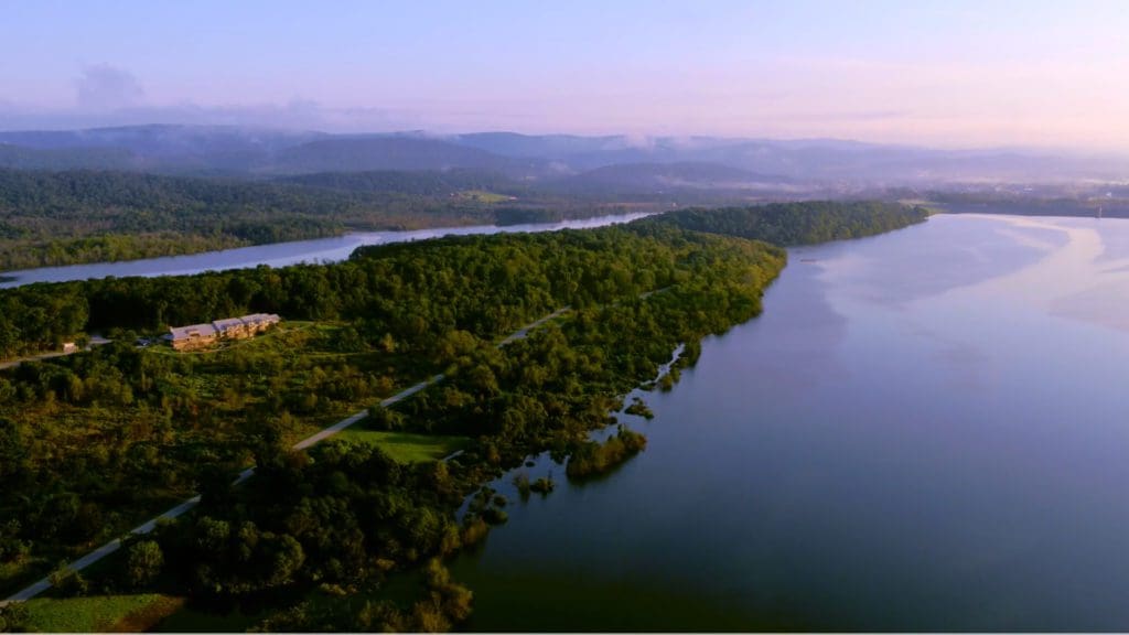 An aerial view of The Nature Inn at Bald Eagle and the surround area along the lake.