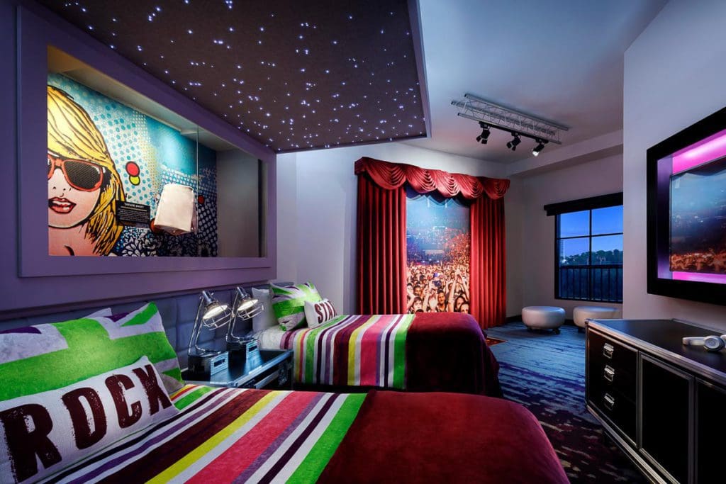 Inside one of the rock star rooms at the Hard Rock Hotel at Universal Orlando, featuring fun colors.