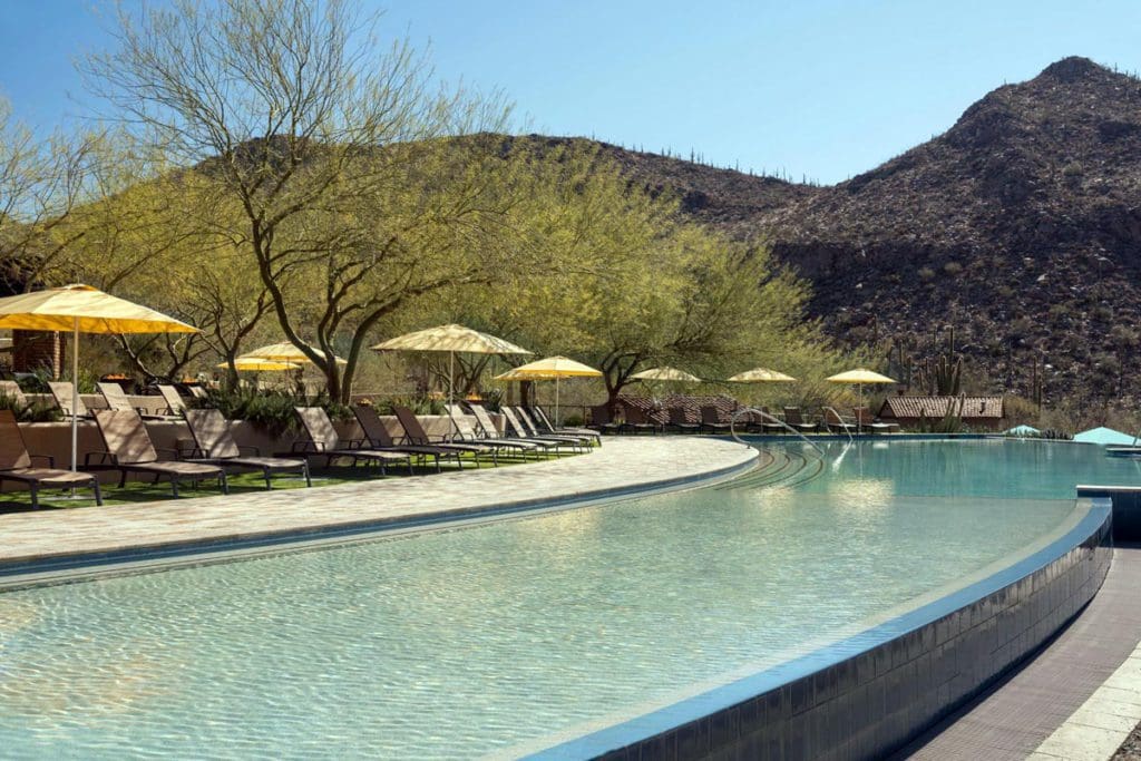 The pool and surrounding pool deck at The Ritz-Carlton, Dove Mountain.