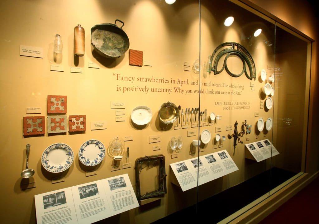 A glass case of Titanic relics at Titanic: The Artifact.