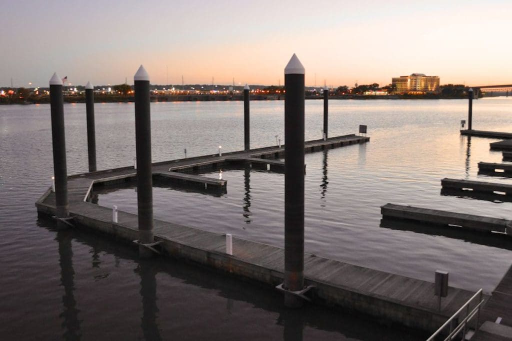 A pier stretched out into the water at dusk in Peoria, Illinois.