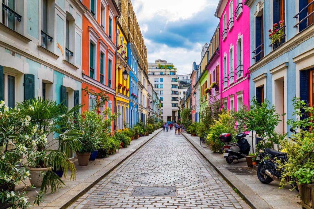 A look down a colorful street, flanked with foliages in the Bercy and Gare de Lyon neighborhood of the 12th Arrondissement in Paris.
