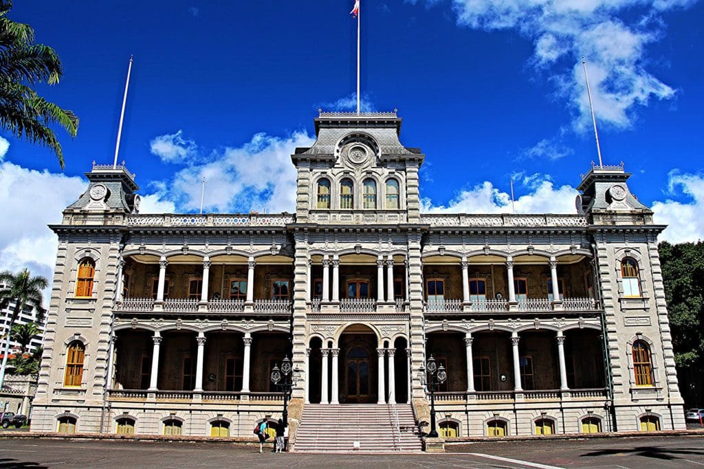 Iolani Palace stands proudly on a sunny day.