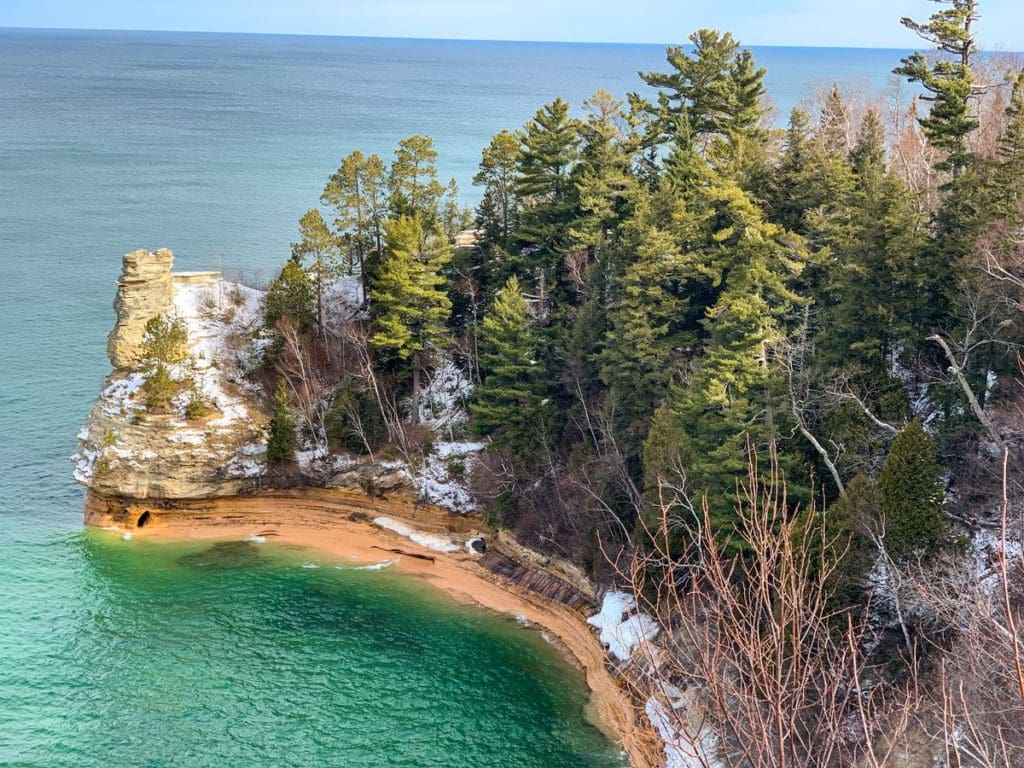 A view of the iconic Miners Castle rock formation at Pictured Rocks National Lakeshore in Michigan on the shores of Lake Superior, one of the best places to visit in Michigan’s Upper Peninsula with kids.