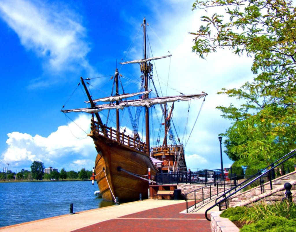 A large pirate ship sits in the bay of Lake Huron in Bay City, one of the best places in Michigan to visit with kids.