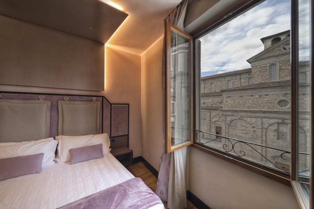 Inside a room with a view of Florence at the Solo Experience Hotel.