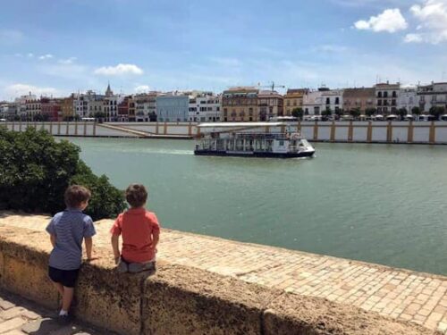 Seville Vacation Families, Two little boys near the river in Seville Vacation with Families