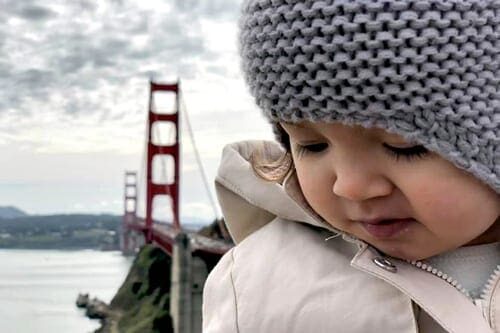 San Francisco Vacation Kids, Little girl in front of Golden Gate Bridge in San Francisco